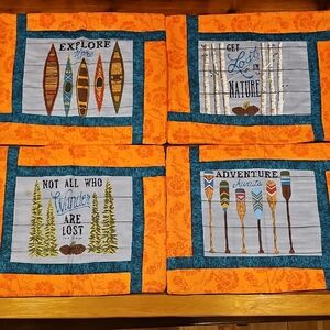 Adventure-Themed Orange and Blue Table Linens